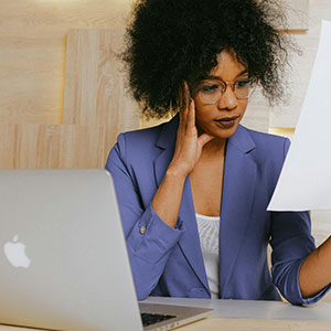 Concerned woman reviewing confusing premarital agreement terms with uncertainty